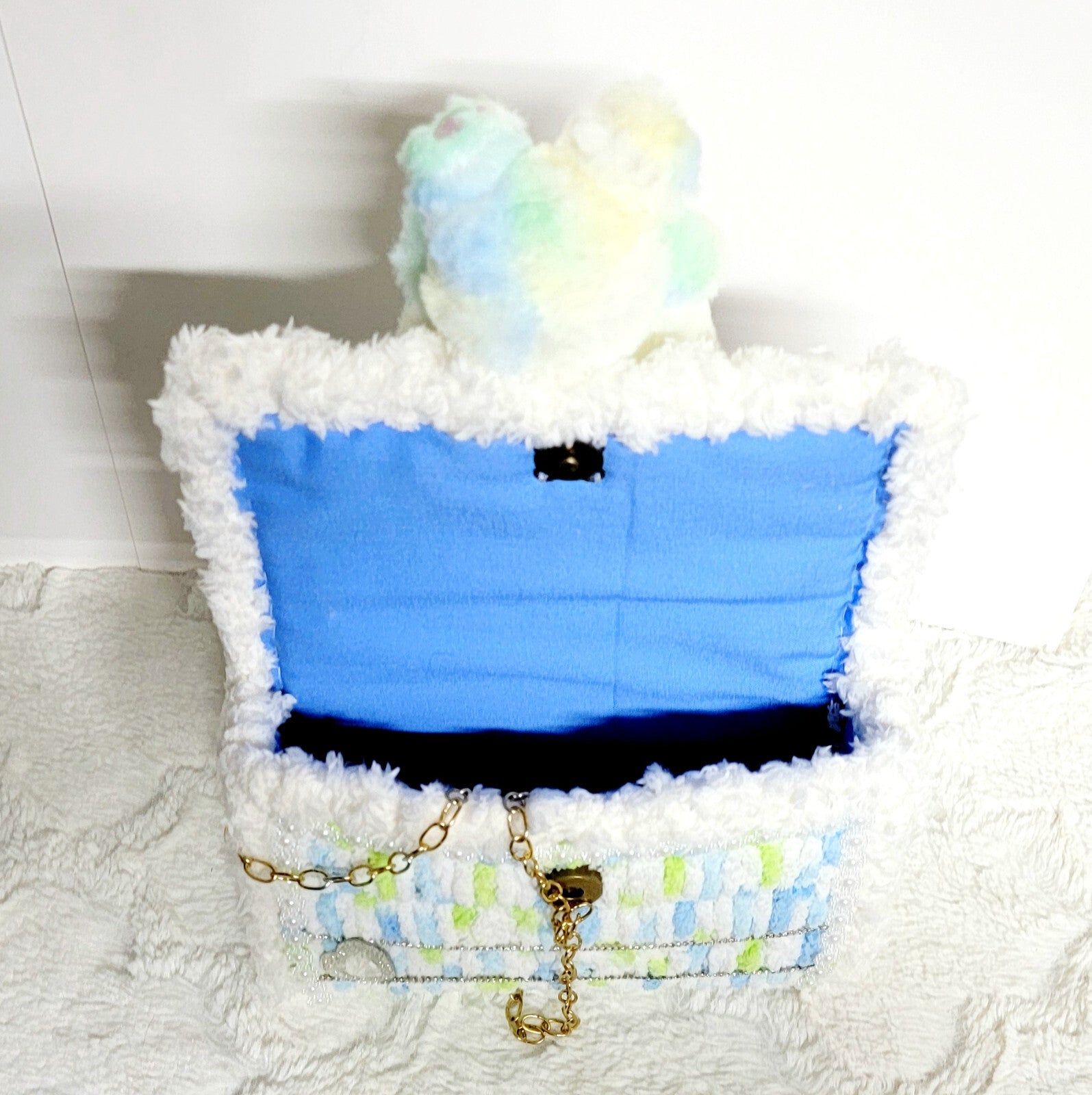 Handmade plastic canvest purse with a Hello Kitty plushy.