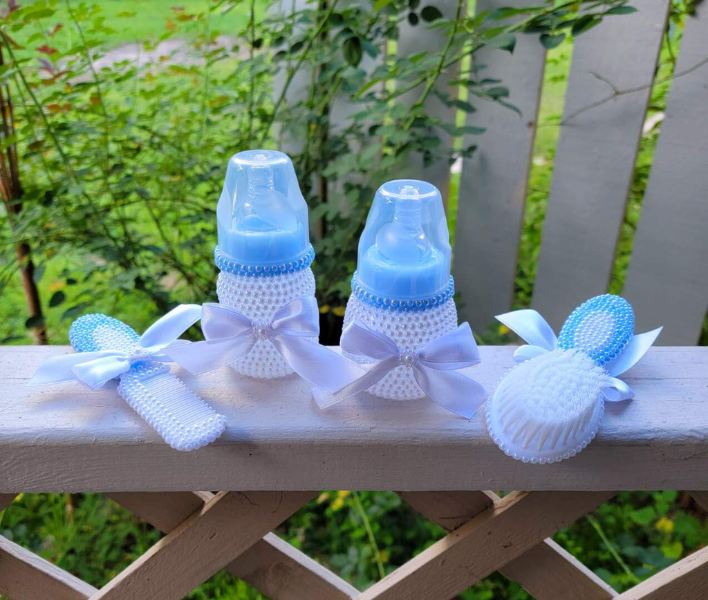 Hand sets rhinestoned baby bottle
